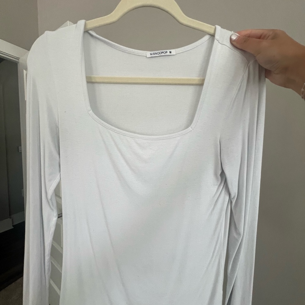 White long sleeve top
